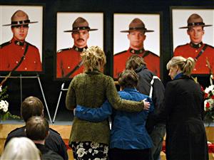 Les photos des quatre policiers tués le 3 mars 2005. Les photos des quatre policiers tués le 3 mars 2005.