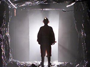 Un mineur dans une mine d'or Un mineur dans une mine d'or