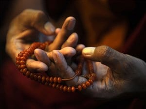 Un Tibétain qui prie. Un Tibétain qui prie.