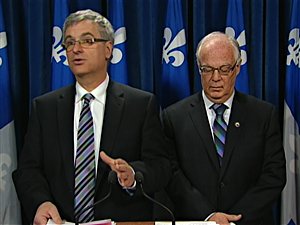 Les ministres Jean-Marc Fournier et Robert Dutil Les ministres Jean-Marc Fournier et Robert Dutil