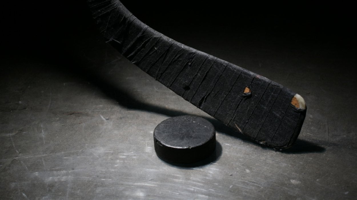 Un baton de hockey Un baton de hockey