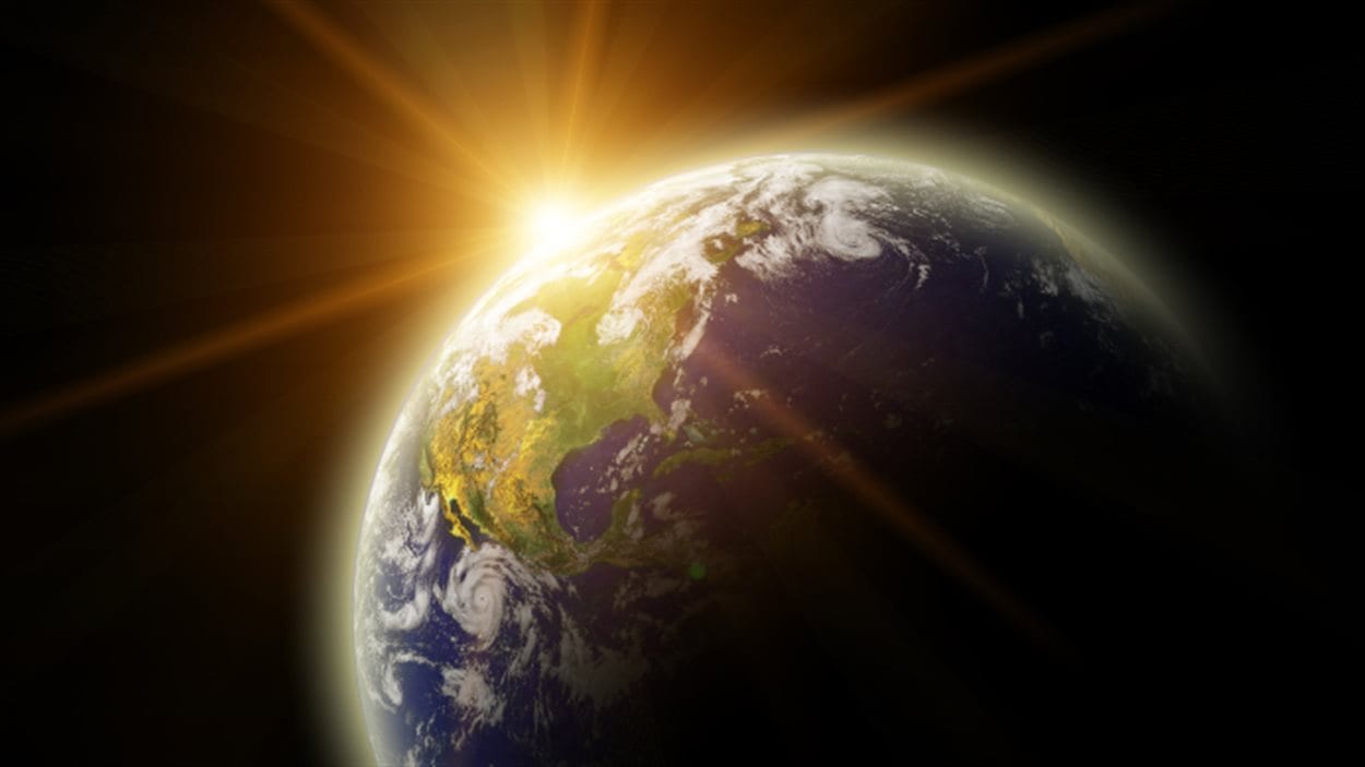 Une vue de la planète Terre et du Soleil Une vue de la planète Terre et du Soleil