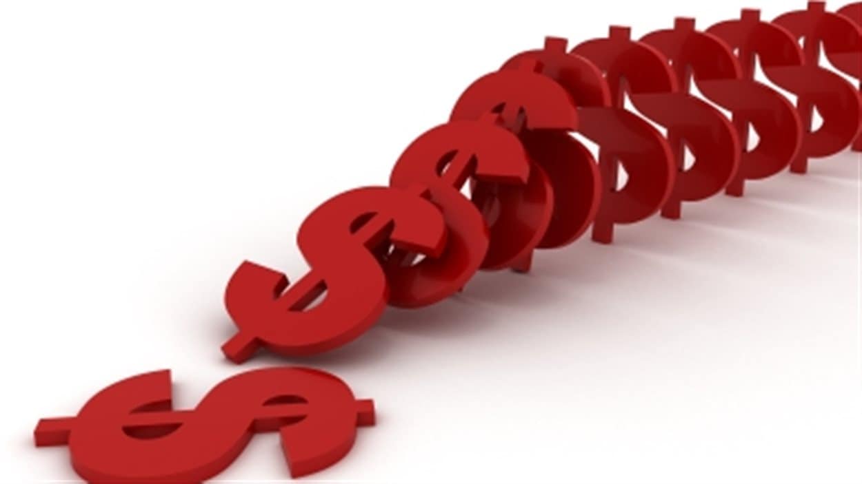 Des signes de dollars placés en domino Des signes de dollars placés en domino