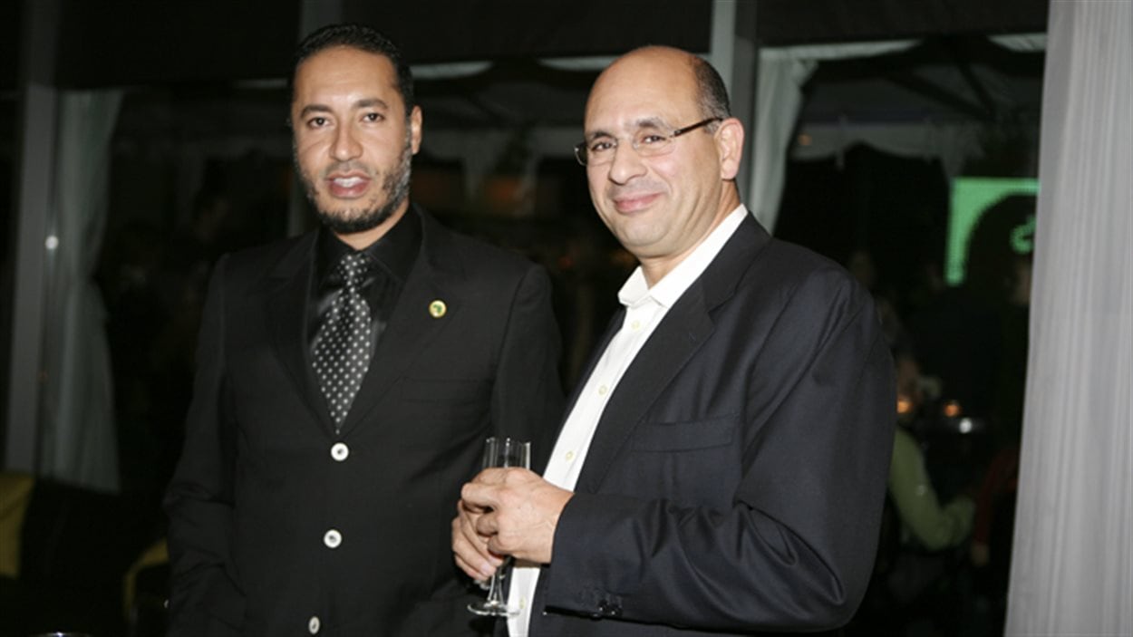Saadi Kadhafi, le fils du dictateur libyen Mouamar Kadhafi, lors d'une réception avec l'ancien vice-président de la division construction de SNC-LAVALIN, Riadh Nen Aissa Saadi Kadhafi, le fils du dictateur libyen Mouamar Kadhafi, lors d'une réception avec l'ancien vice-président de la division construction de SNC-LAVALIN, Riadh Nen Aissa