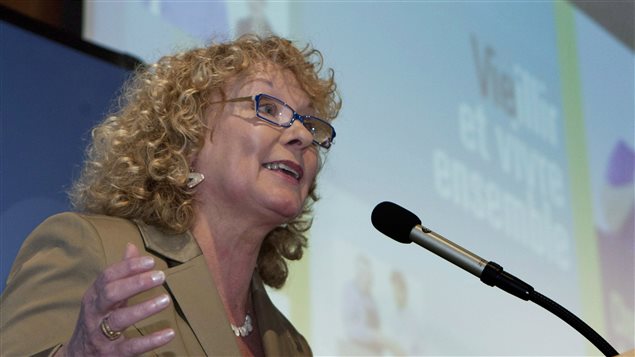 La députée libérale de Sainte-Marie-Sainte-Anne durant une allocution en mai 2012. La députée libérale de Sainte-Marie-Sainte-Anne durant une allocution en mai 2012.