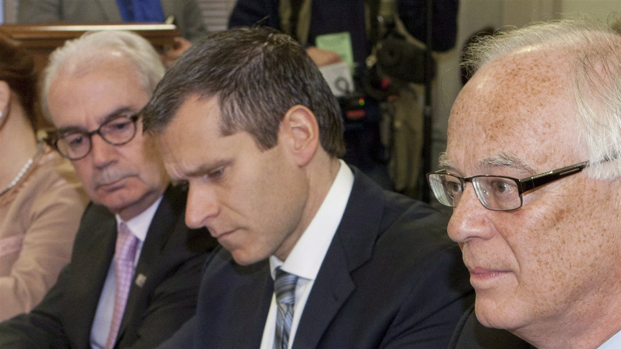 Le sous-ministre Martin Prud'homme (au centre) en compagnie du commissaire de l'UPAC Robert Lafrenière (gauche) et de Robert Dutil, ministre de la Sécurité publique (droite), à Québec (archive) Le sous-ministre Martin Prud'homme (au centre) en compagnie du commissaire de l'UPAC Robert Lafrenière (gauche) et de Robert Dutil, ministre de la Sécurité publique (droite), à Québec (archive)