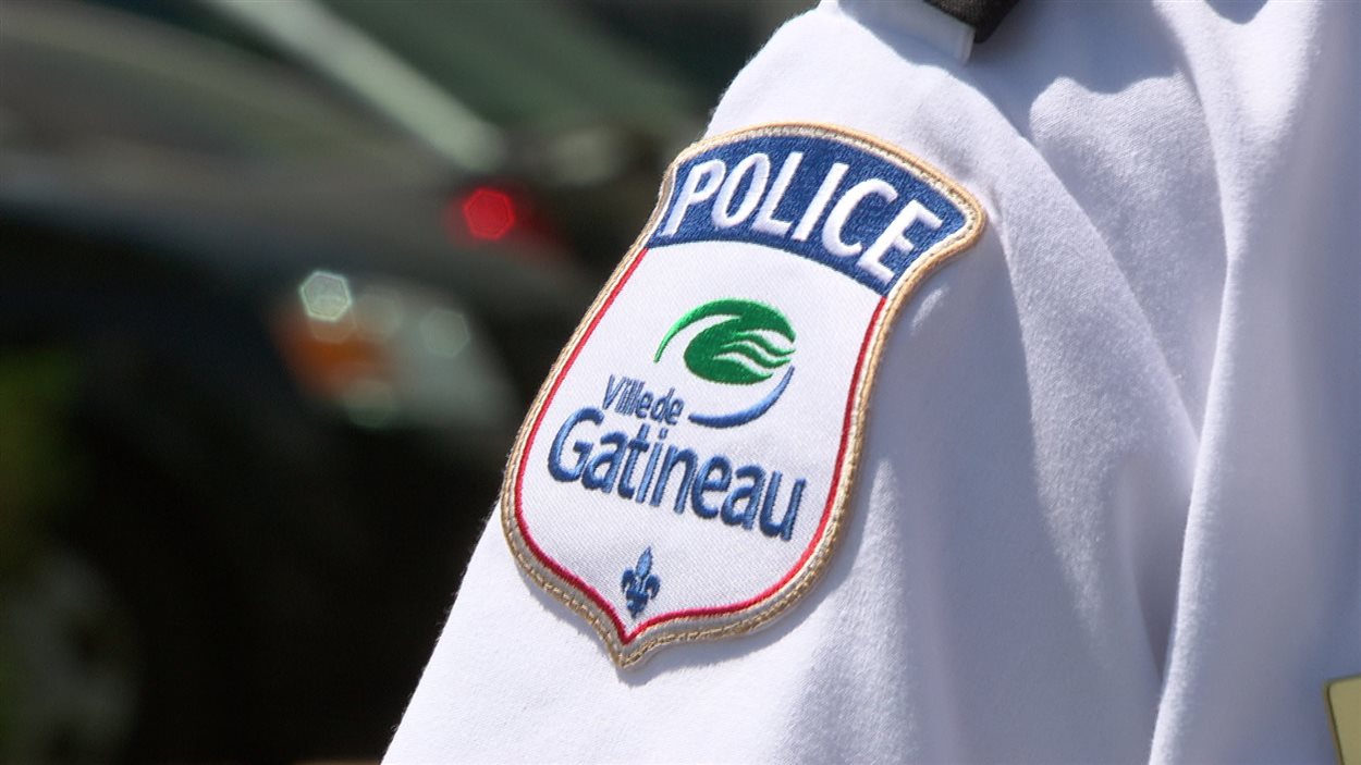 L'écusson du Service de police de la Ville de Gatineau (SPVG). L'écusson du Service de police de la Ville de Gatineau (SPVG).