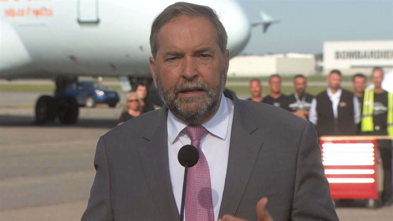Le chef du Nouveau Parti démocratique, Thomas Mulcair, a dévoilé le plan de son parti pour l'industrie aérospatiale. Le chef du Nouveau Parti démocratique, Thomas Mulcair, a dévoilé le plan de son parti pour l'industrie aérospatiale.