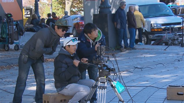 Trois membres de l'équipe de tournage Trois membres de l'équipe de tournage