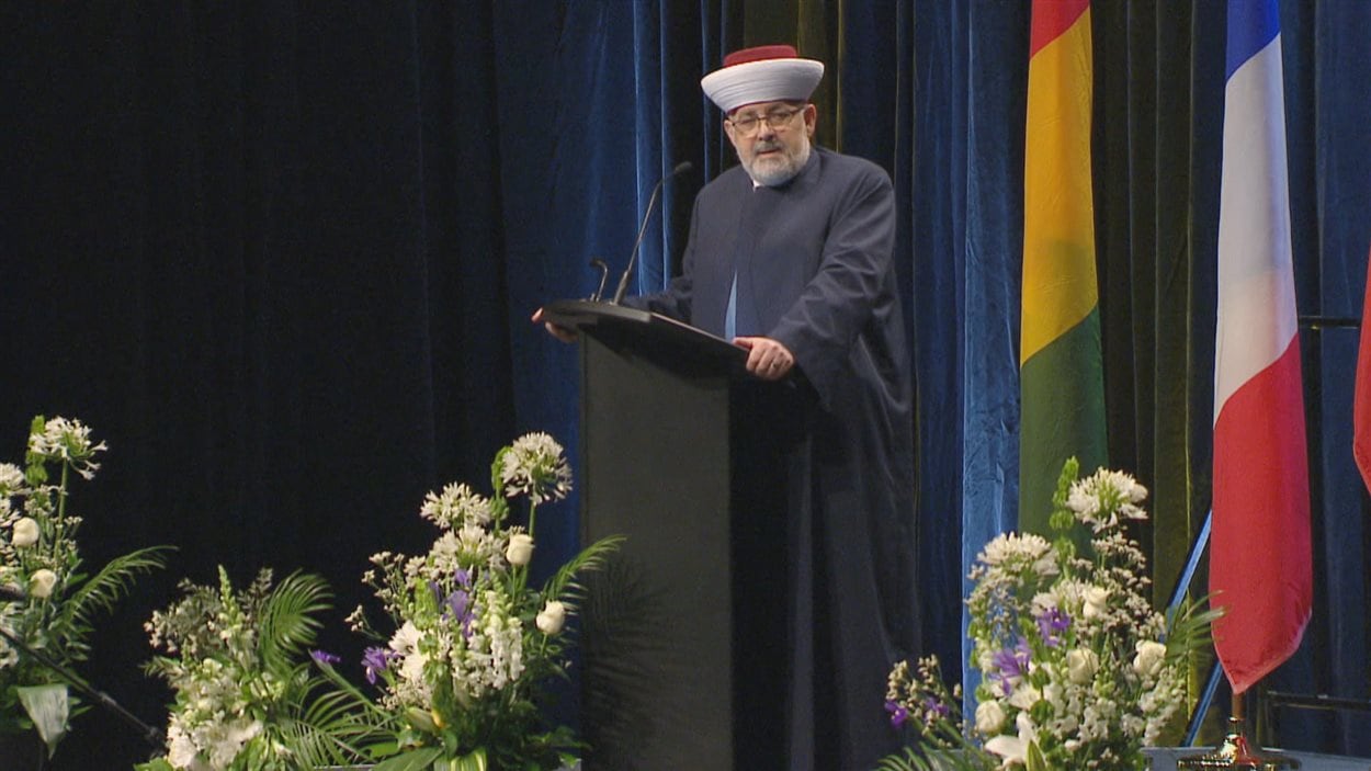 Monsieur Hassan Guillet lors des funérailles des victimes de l'attentat de Québec.
